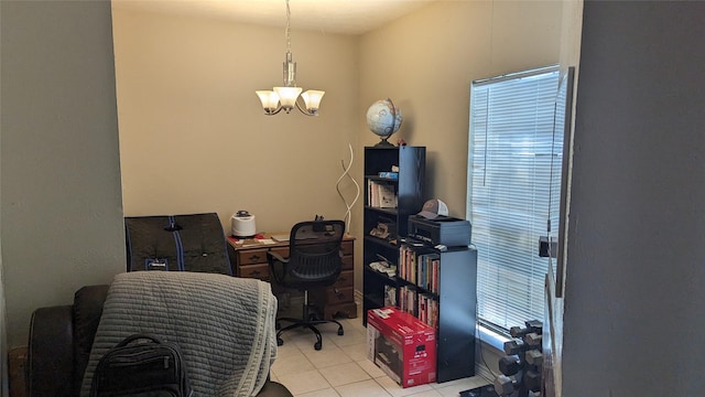 home office with a chandelier and light tile patterned floors