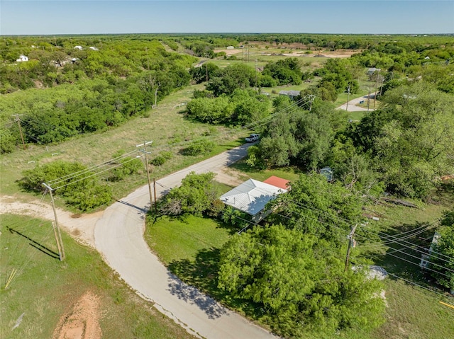 bird's eye view featuring a view of trees