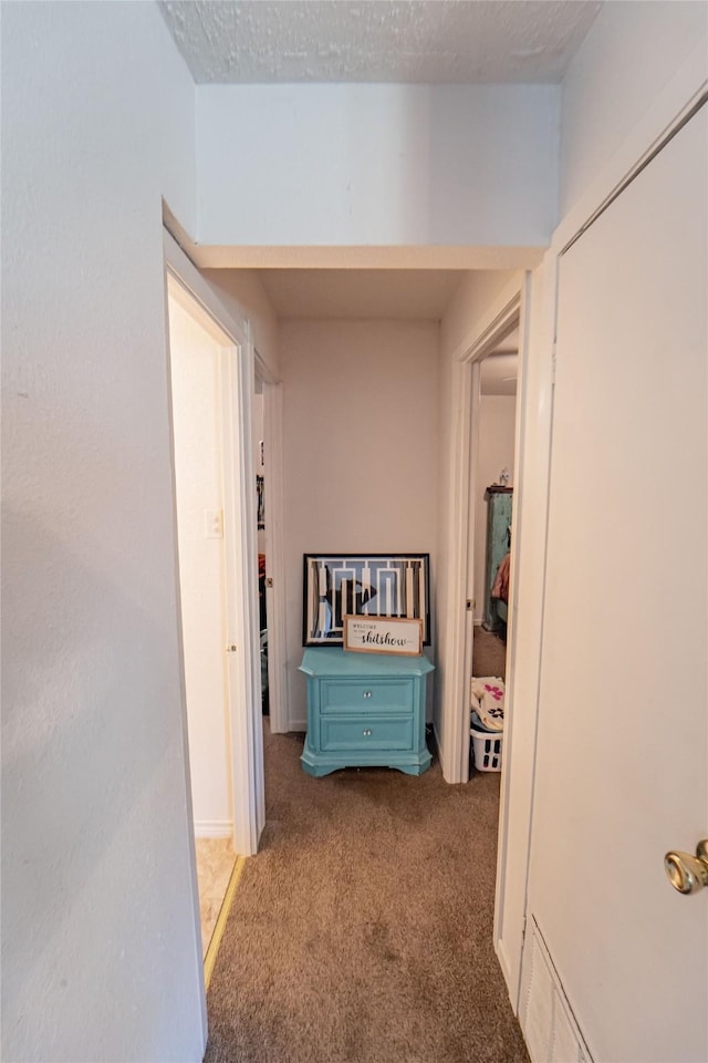 corridor featuring carpet