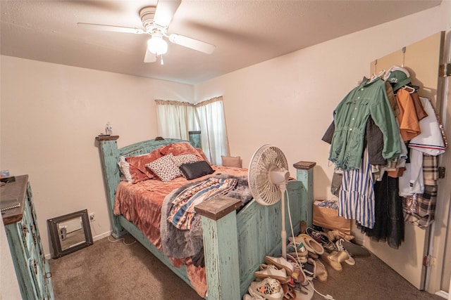 carpeted bedroom with a ceiling fan