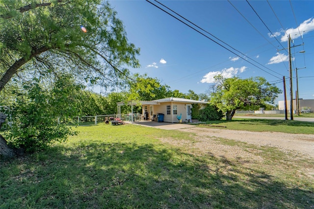view of yard with a patio and fence