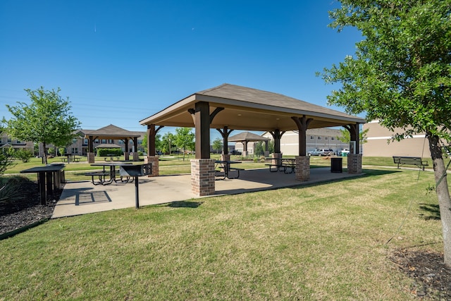 view of community featuring a lawn and a gazebo