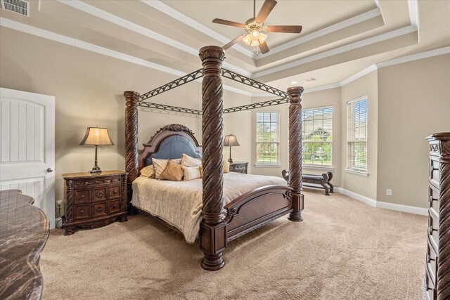 902 Alfred Dr, Wylie, TX 75098 - bedroom with light colored carpet, ornamental molding, baseboards, a raised ceiling, and ceiling fan