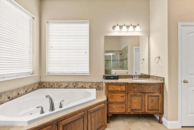 902 Alfred Dr, Wylie, TX 75098 - bathroom featuring a stall shower, plenty of natural light, a bath, and vanity