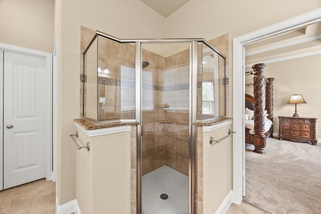 902 Alfred Dr, Wylie, TX 75098 - ensuite bathroom featuring a stall shower, lofted ceiling, and baseboards
