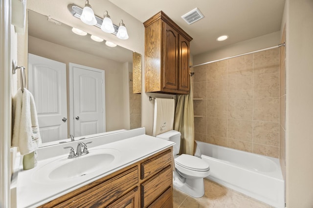 full bathroom with tile patterned flooring, vanity, toilet, shower / tub combo, and visible vents