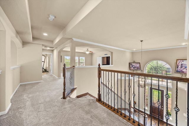 902 Alfred Dr, Wylie, TX 75098 - hall featuring an upstairs landing, carpet, baseboards, recessed lighting, and arched walkways