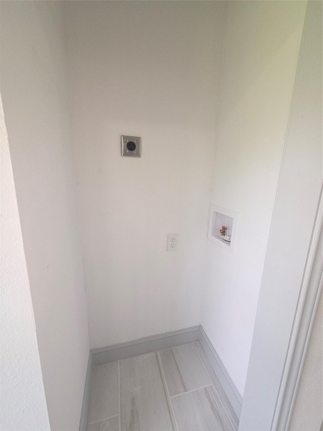 4841 Bromfield St, Dallas, TX 75216 - laundry area with baseboards, electric dryer hookup, laundry area, and washer hookup