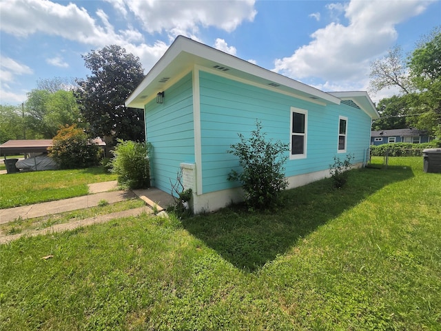 4841 Bromfield St, Dallas, TX 75216 - view of side of home featuring a lawn