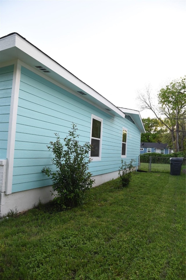 4841 Bromfield St, Dallas, TX 75216 - view of home's exterior featuring a lawn