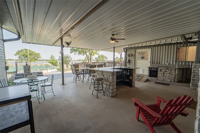 view of patio / terrace featuring outdoor dry bar