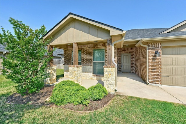 2401 Southridge Ln, Sherman, TX 75092 - doorway to property featuring fence, roof with shingles, an attached garage, and brick siding