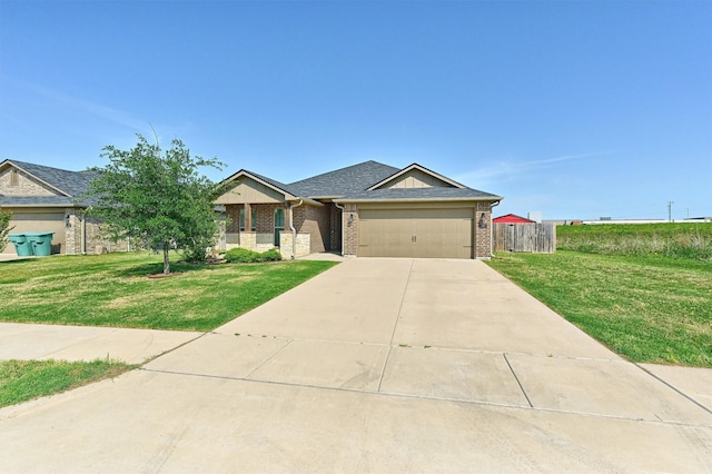 2401 Southridge Ln, Sherman, TX 75092 - ranch-style home featuring concrete driveway, fence, brick siding, a front lawn, and a garage