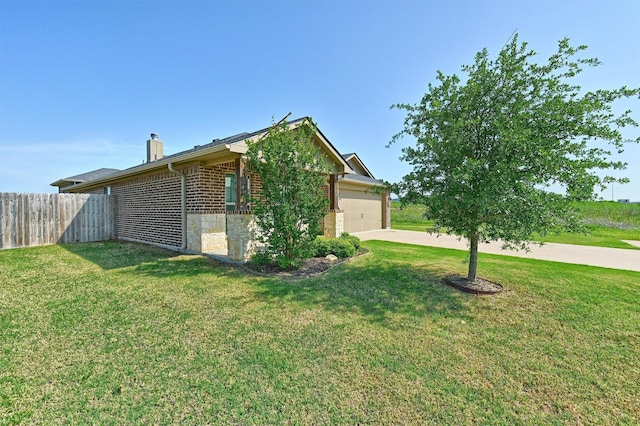 2401 Southridge Ln, Sherman, TX 75092 - view of home's exterior featuring a yard, an attached garage, a chimney, and fence