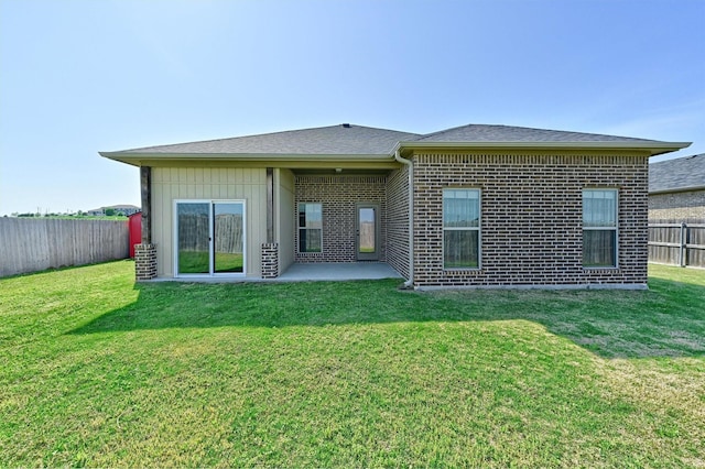 2401 Southridge Ln, Sherman, TX 75092 - rear view of property featuring a patio, a lawn, and a fenced backyard