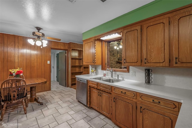 2007 Venus Dr, Bossier City, LA 71112 - kitchen featuring a ceiling fan, brown cabinetry, a sink, and dishwasher