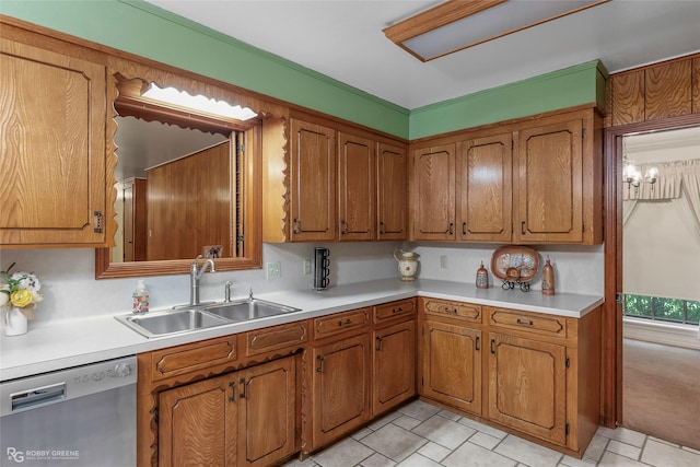 2007 Venus Dr, Bossier City, LA 71112 - kitchen with stainless steel dishwasher, brown cabinetry, and a sink
