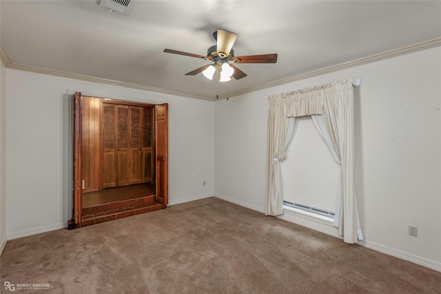 2007 Venus Dr, Bossier City, LA 71112 - unfurnished bedroom featuring visible vents, crown molding, a baseboard radiator, carpet flooring, and baseboards