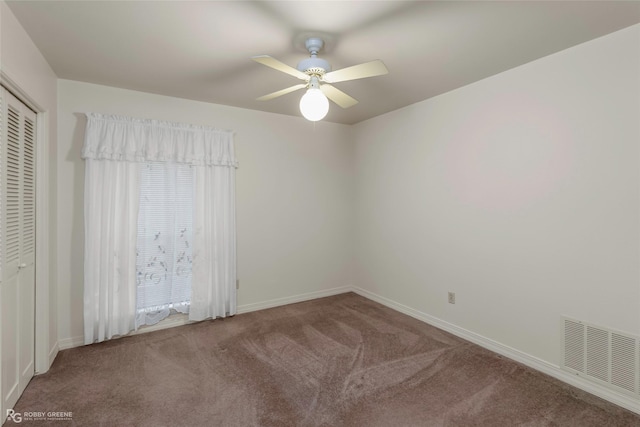 2007 Venus Dr, Bossier City, LA 71112 - unfurnished room with carpet flooring, visible vents, baseboards, and ceiling fan