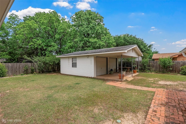 2007 Venus Dr, Bossier City, LA 71112 - exterior space with an outdoor structure, a garage, and a fenced backyard