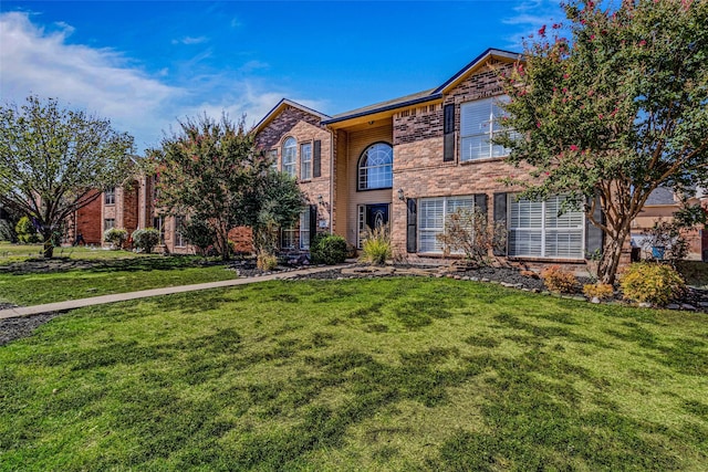 139 Wembley Way, Rockwall, TX 75032 - view of front facade with a front lawn and brick siding