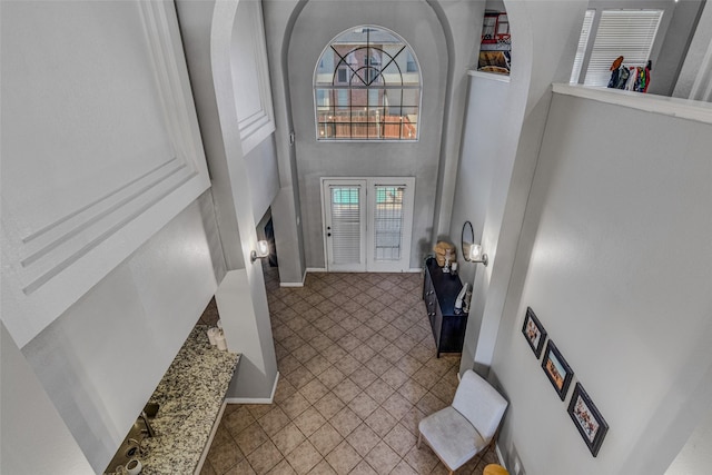 139 Wembley Way, Rockwall, TX 75032 - entrance foyer featuring a high ceiling and tile patterned flooring