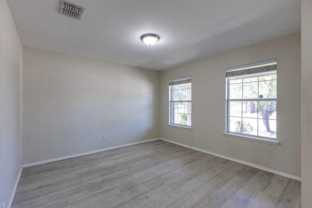 717 Baldwin Rd, Wylie, TX 75098 - spare room featuring wood finished floors and baseboards