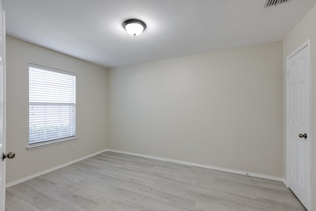717 Baldwin Rd, Wylie, TX 75098 - spare room featuring light wood-style flooring and baseboards