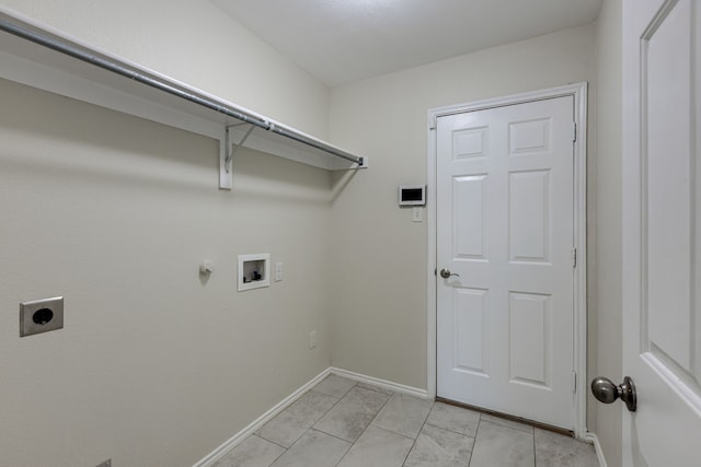 717 Baldwin Rd, Wylie, TX 75098 - laundry area with electric dryer hookup, washer hookup, baseboards, hookup for a gas dryer, and light tile patterned floors