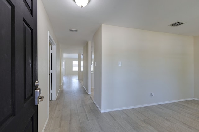 717 Baldwin Rd, Wylie, TX 75098 - hallway featuring light wood-style flooring and baseboards