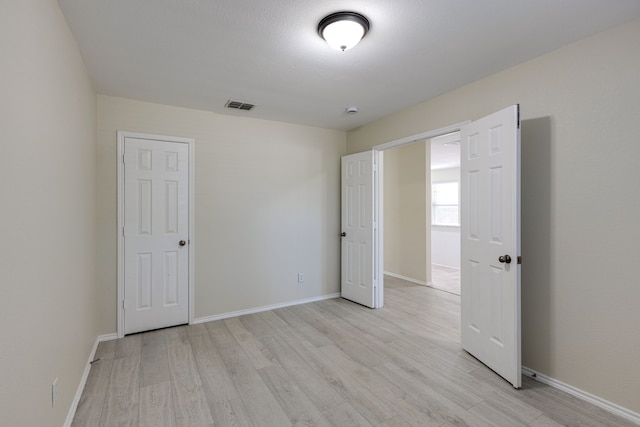 717 Baldwin Rd, Wylie, TX 75098 - unfurnished bedroom with light wood-style floors and baseboards