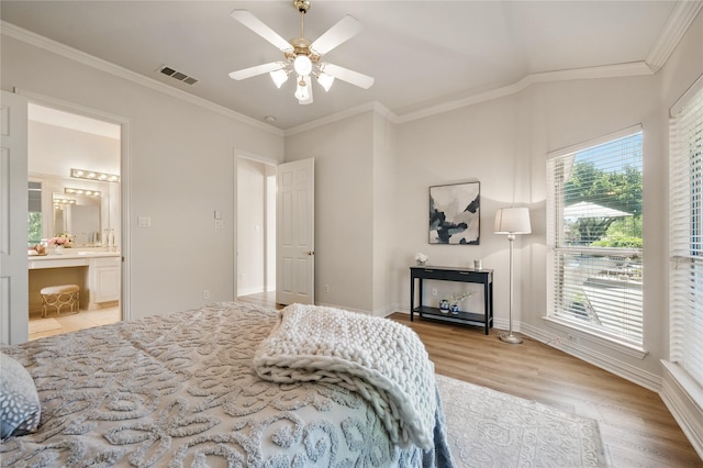 2110 Watercrest Ct, Keller, TX 76248 - bedroom with light wood-style flooring, visible vents, crown molding, and baseboards