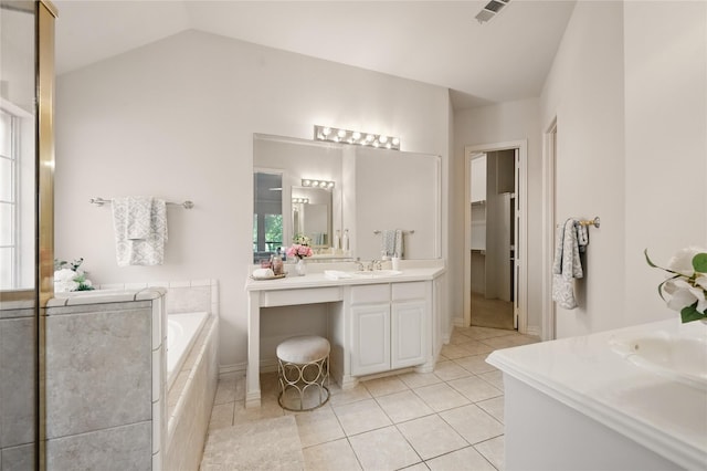 2110 Watercrest Ct, Keller, TX 76248 - bathroom featuring a bath, vaulted ceiling, visible vents, tile patterned flooring, and vanity