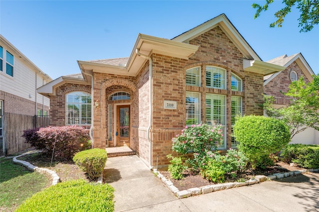 2110 Watercrest Ct, Keller, TX 76248 - view of front of home with brick siding, fence, and a shingled roof