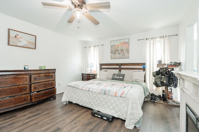bedroom featuring wood finished floors and ceiling fan