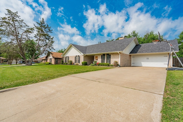 ranch-style home with a front lawn, concrete driveway, brick siding, an attached garage, and a shingled roof