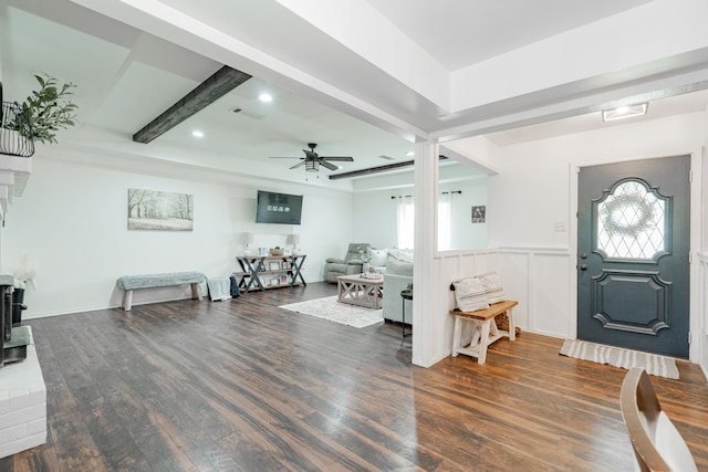 foyer with a ceiling fan, wood finished floors, visible vents, and a healthy amount of sunlight