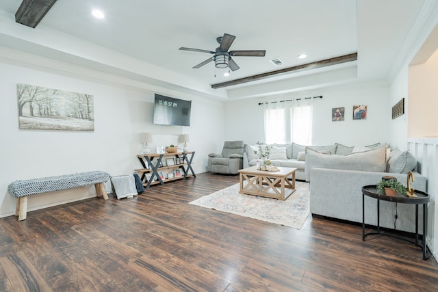 living area featuring wood finished floors, ceiling fan, a raised ceiling, visible vents, and recessed lighting