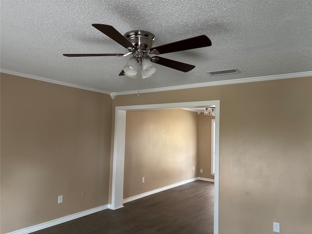 3741 Trinity Ln, Abilene, TX 79602 - empty room with ceiling fan, a textured ceiling, wood finished floors, baseboards, and crown molding
