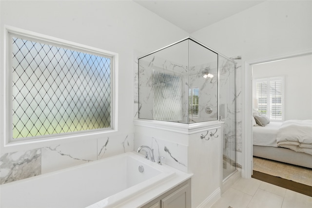 579 Point Vista Dr, Aledo, TX 76008 - ensuite bathroom with a marble finish shower, a garden tub, and tile patterned flooring