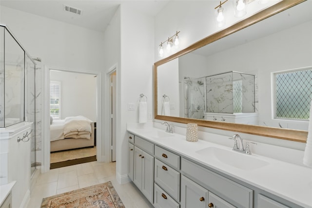 579 Point Vista Dr, Aledo, TX 76008 - full bath featuring a marble finish shower, double vanity, and connected bathroom