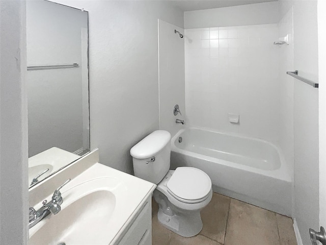 bathroom with vanity, toilet, tile patterned flooring, and shower / bathing tub combination