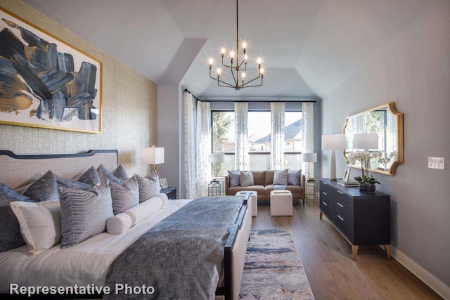 bedroom featuring an inviting chandelier, lofted ceiling, wood finished floors, and baseboards