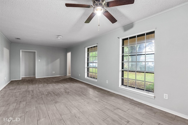 1908 Bey St, Bossier City, LA 71112 - empty room with ceiling fan, crown molding, visible vents, a textured ceiling, and wood finished floors