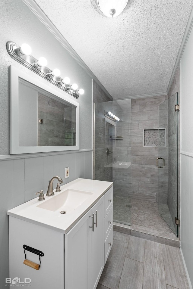 1908 Bey St, Bossier City, LA 71112 - full bath featuring ornamental molding, a shower stall, a textured ceiling, and vanity