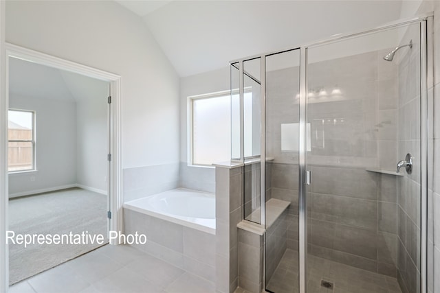 4933 Hitching Post Dr, Fort Worth, TX 76036 - bathroom with vaulted ceiling, a shower stall, and a healthy amount of sunlight