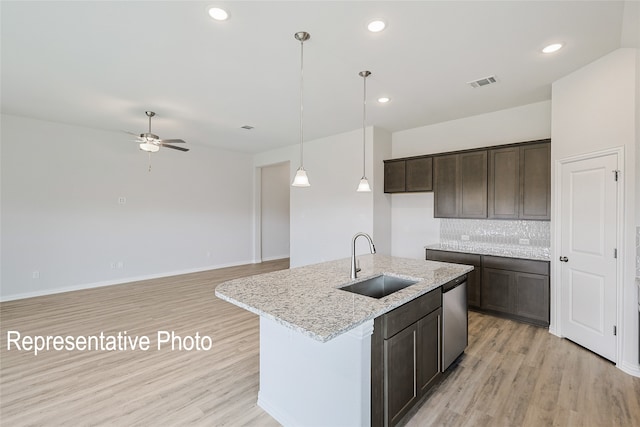 4933 Hitching Post Dr, Fort Worth, TX 76036 - kitchen with light wood-style flooring, a sink, visible vents, a ceiling fan, and dishwasher