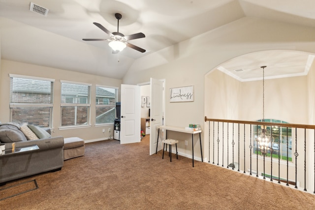 sitting room with visible vents, carpet floors, lofted ceiling, arched walkways, and ceiling fan with notable chandelier