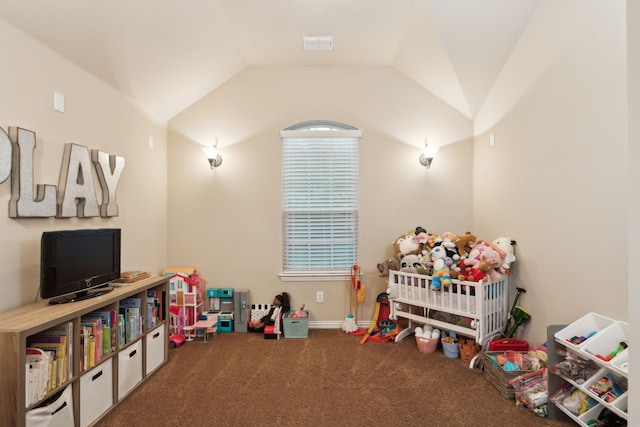 rec room with carpet flooring and vaulted ceiling