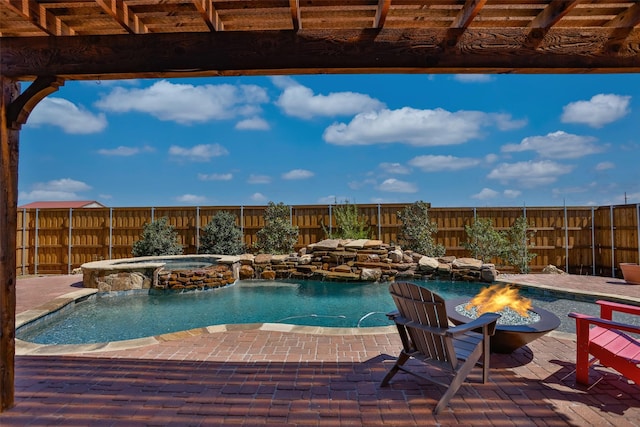 3236 Camden Creek Rd, Krum, TX 76249 - view of pool featuring a fire pit, a fenced backyard, a pool with connected hot tub, and a patio